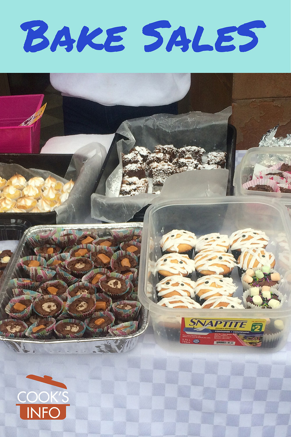 Photo of a table with baked goods for sale on it