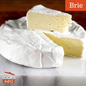 Wedge of brie on top a circle of brie