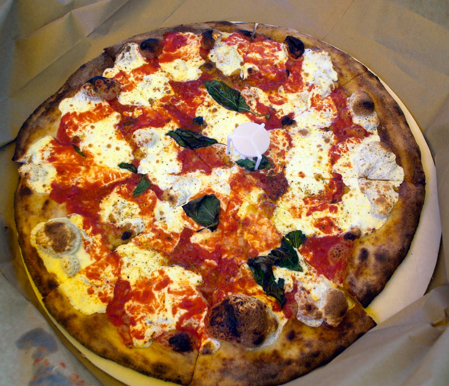 Pizza from Grimaldi's Pizzeria's Brooklyn Bridge, New York City