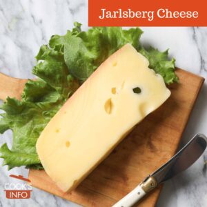 Jarlsberg Cheese on wooden board