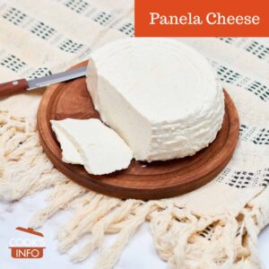 Fresh Mexican panela cheese on wooden board