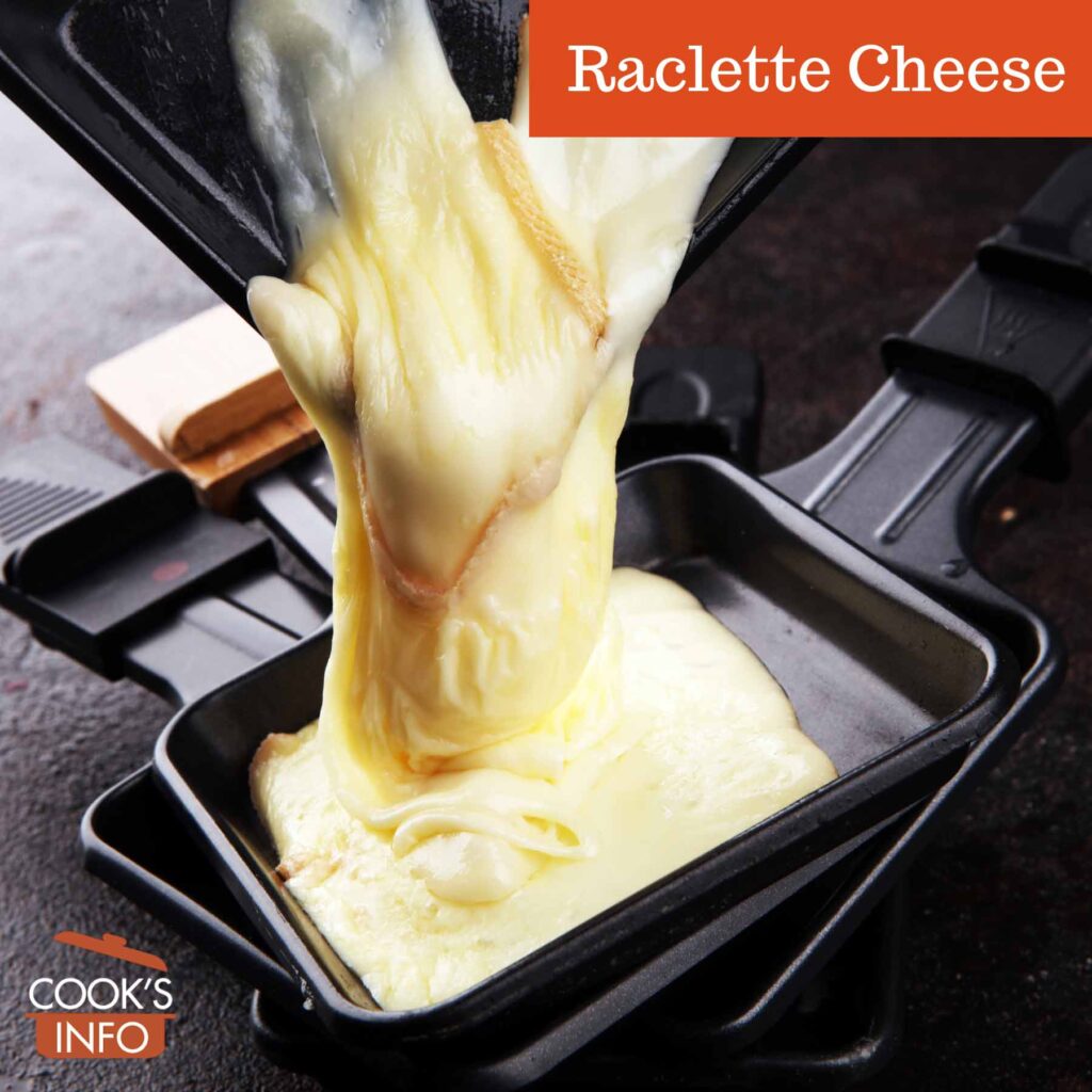 Raclette cheese melted in individual raclette skillets