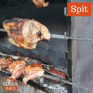 Spits in outdoor market in Lessay, France