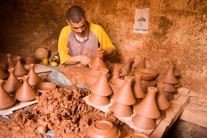 Tagines being formed by a potter