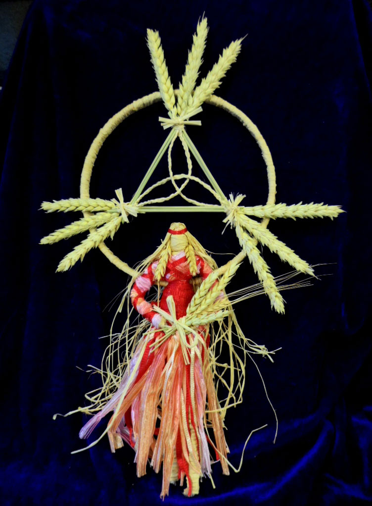 Celtic corn goddess dolly representing Taillitu, with Celtic Trinity symbol