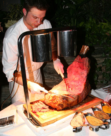 Roasted beef being served as a meat dish